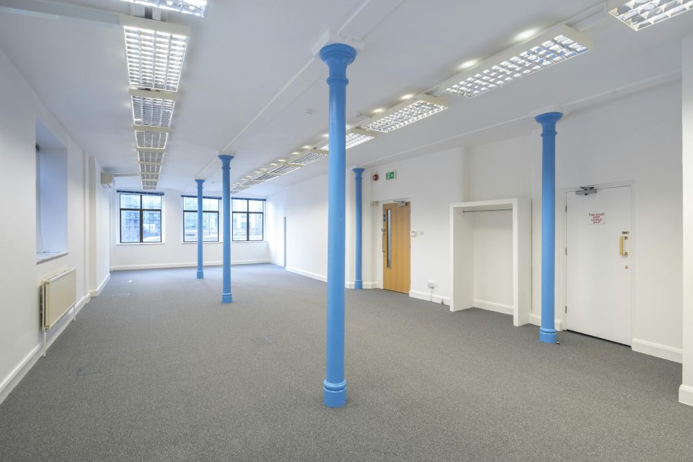 office with blue pillars